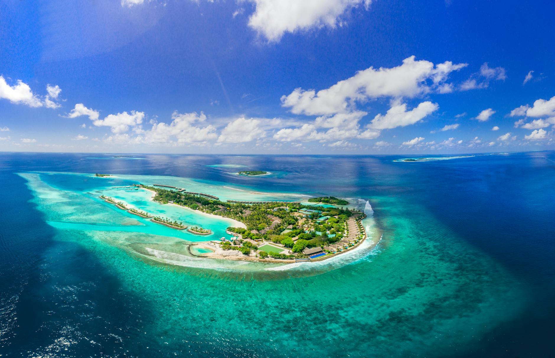 Aerial view of pristine tropical island surrounded by turquoise waters