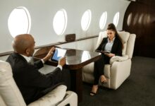 Luxurious private jet cabin interior with modern seating and ambient lighting