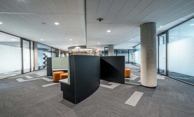 Modern bank interior with teller counters and professional lighting