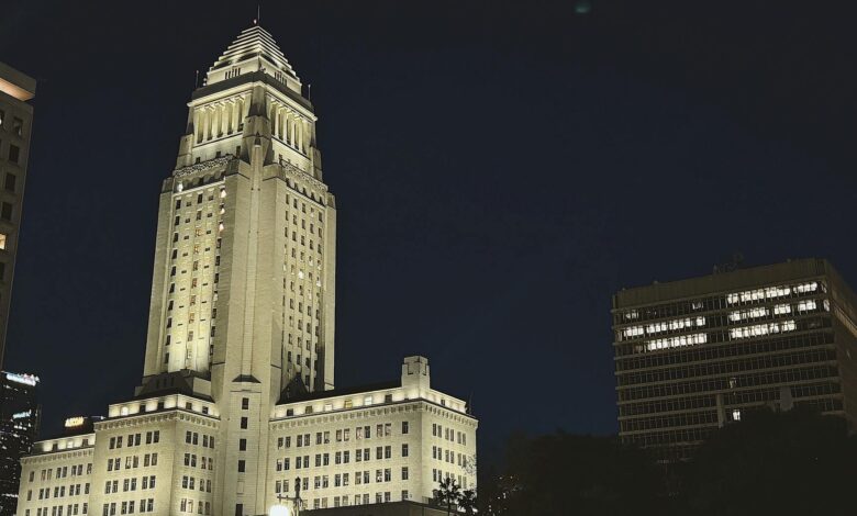 Modern city hall building representing local government authority over federal policies