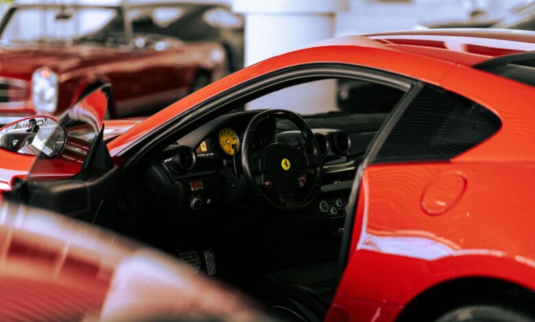Row of luxury vehicles at an upscale automotive facility