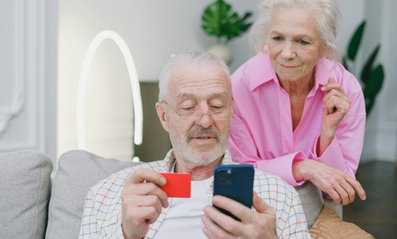 Senior couple reviewing financial documents and investment statements