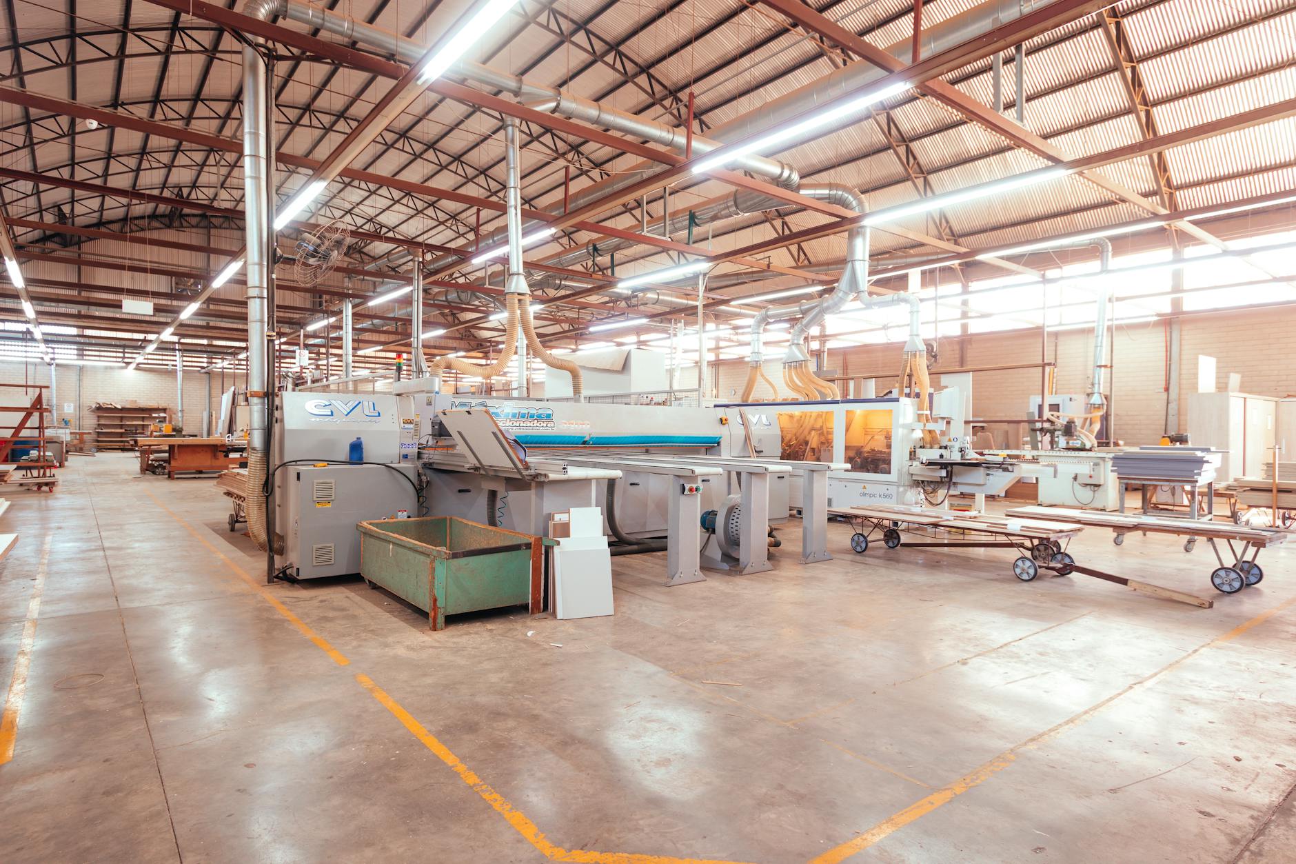 Modern manufacturing facility interior with industrial equipment and machinery