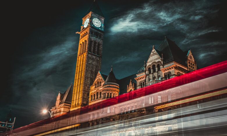 Municipal officials meeting in city hall chamber discussing policy coordination