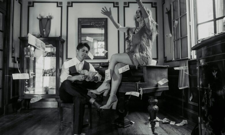 Aerial view of a modern sports stadium with surrounding cityscape