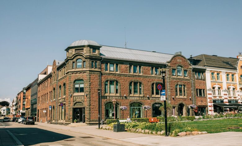 Empty small town bank building with closed sign, representing rural banking branch closures