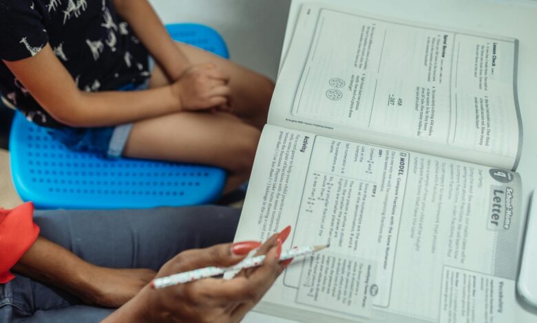 One-on-one tutoring session showing personalized educational instruction between teacher and student