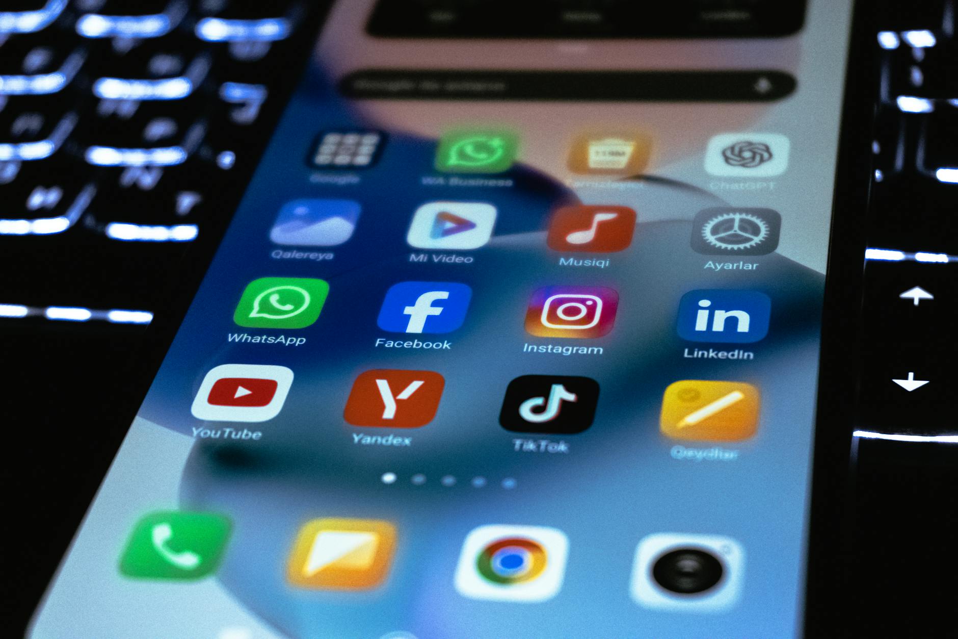 Person using smartphone with social media apps, representing digital organizing tools used by gig workers