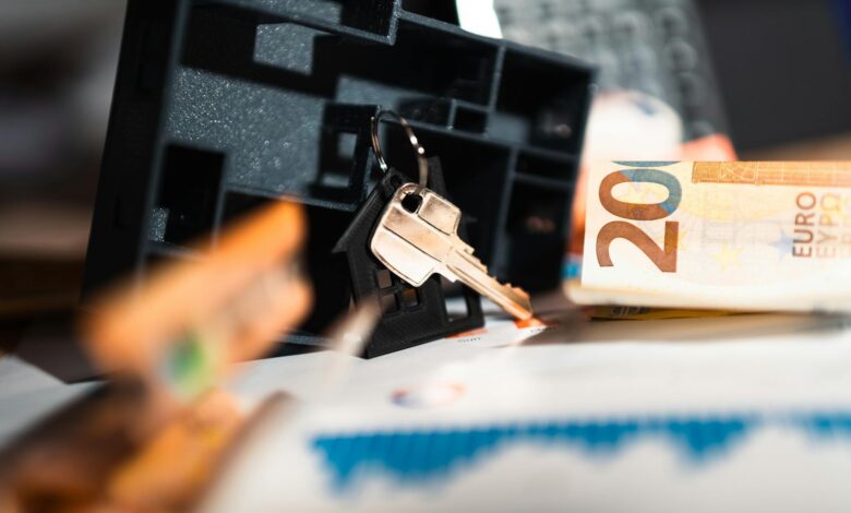 Real estate contract with house keys showing home purchase documentation