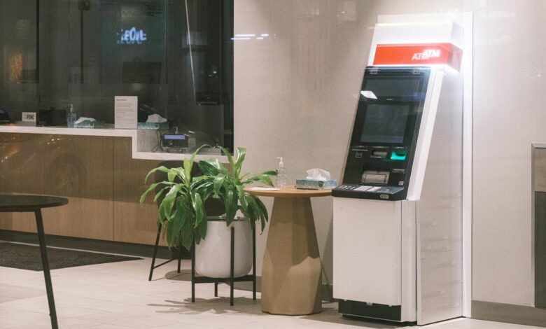 Modern bank interior with teller windows and customer service area