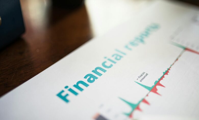 Financial documents and paperwork spread on desk showing investment planning materials