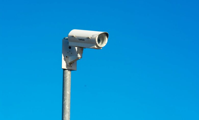 Modern security camera system mounted on building exterior for residential protection