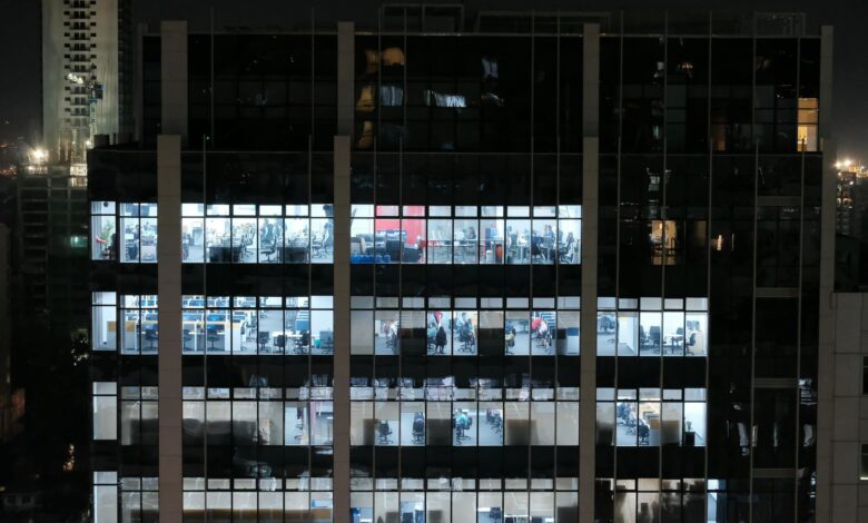 Empty modern office building with vacant floors reflecting the commercial real estate crisis affecting regional banks