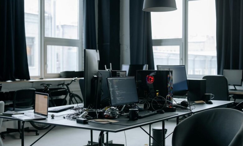 Computer screen displaying hiring software interface with resume data and candidate profiles