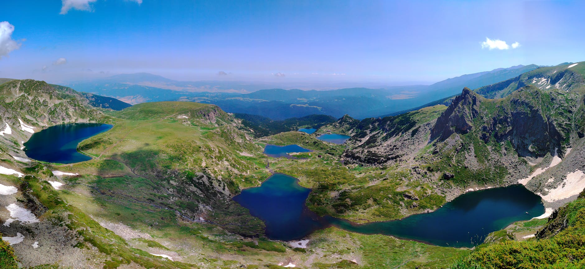 Pristine mountain lake surrounded by forest, representing Canada's abundant natural water resources