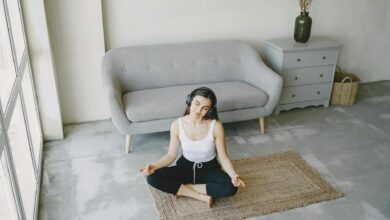 Modern office meditation and wellness space with comfortable seating and natural lighting