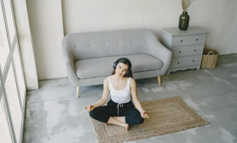 Modern office meditation and wellness space with comfortable seating and natural lighting