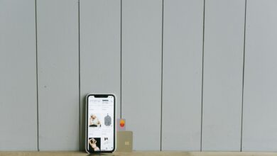 Person using smartphone for mobile banking and financial transactions