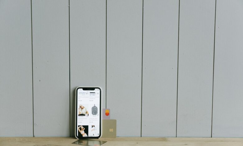 Person using smartphone for mobile banking and financial transactions