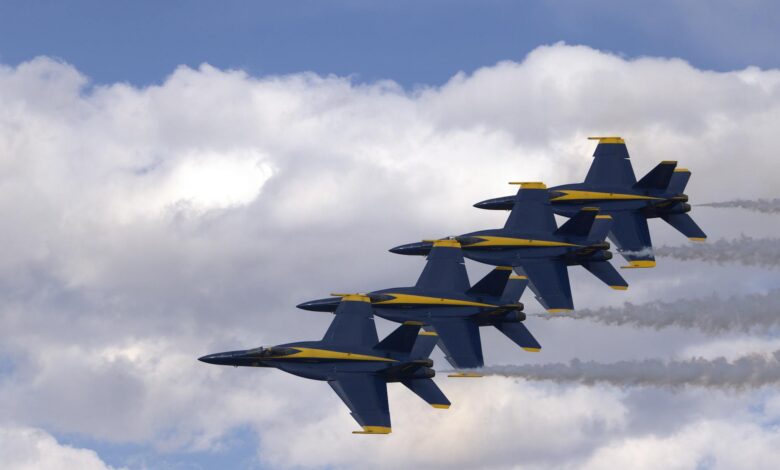 Modern military fighter jets on runway representing defense industry growth