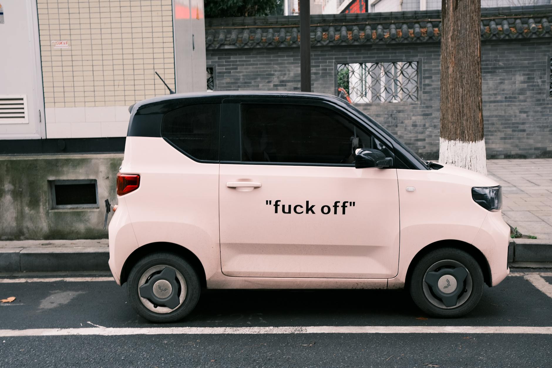 Close-up view of electric vehicle charging port and modern automotive technology