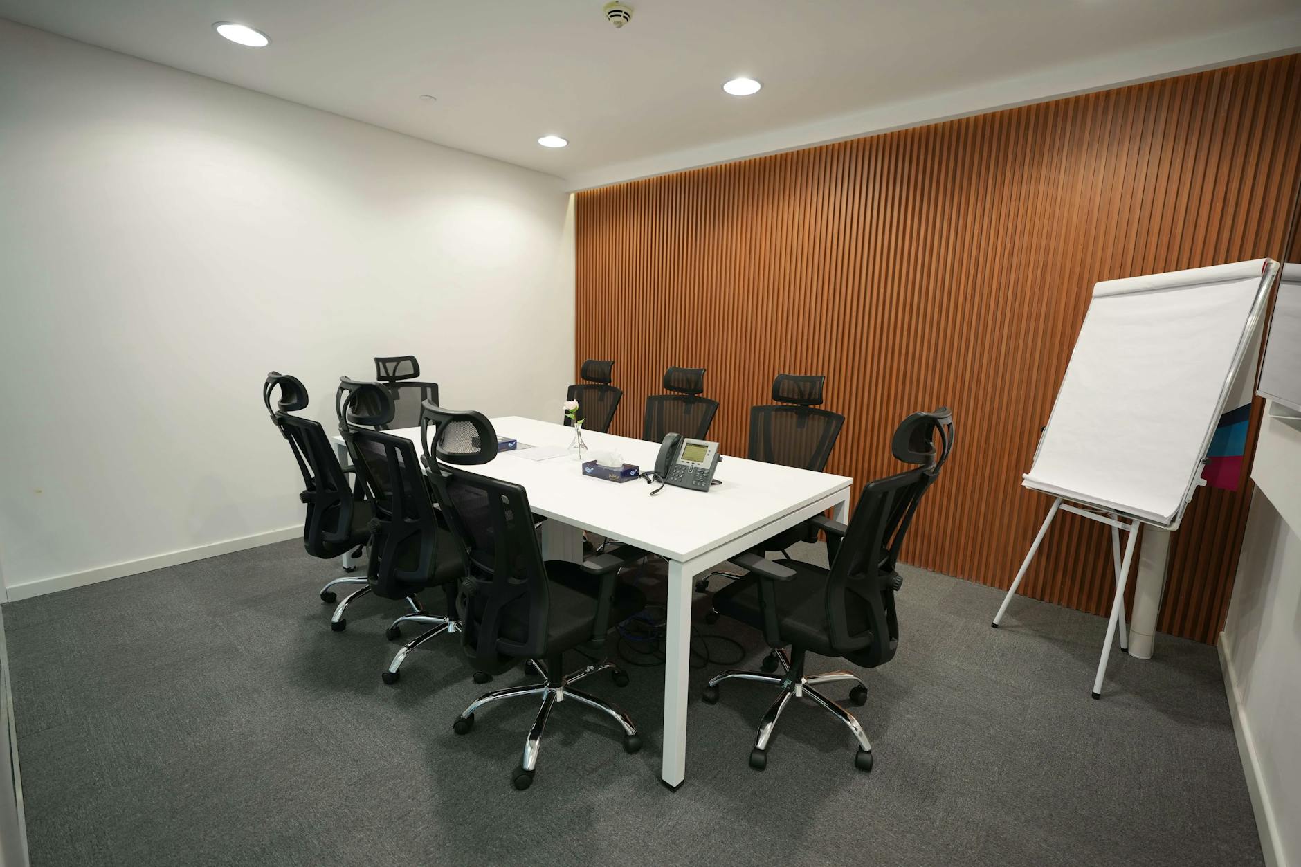 Professional bank meeting room with conference table and chairs for financial consultations
