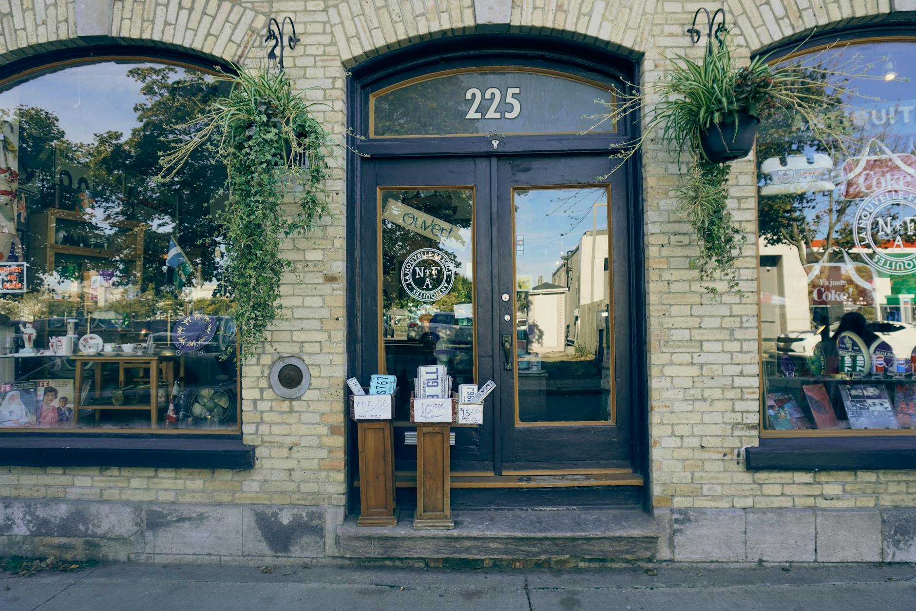 Small business storefront with open sign and welcoming entrance