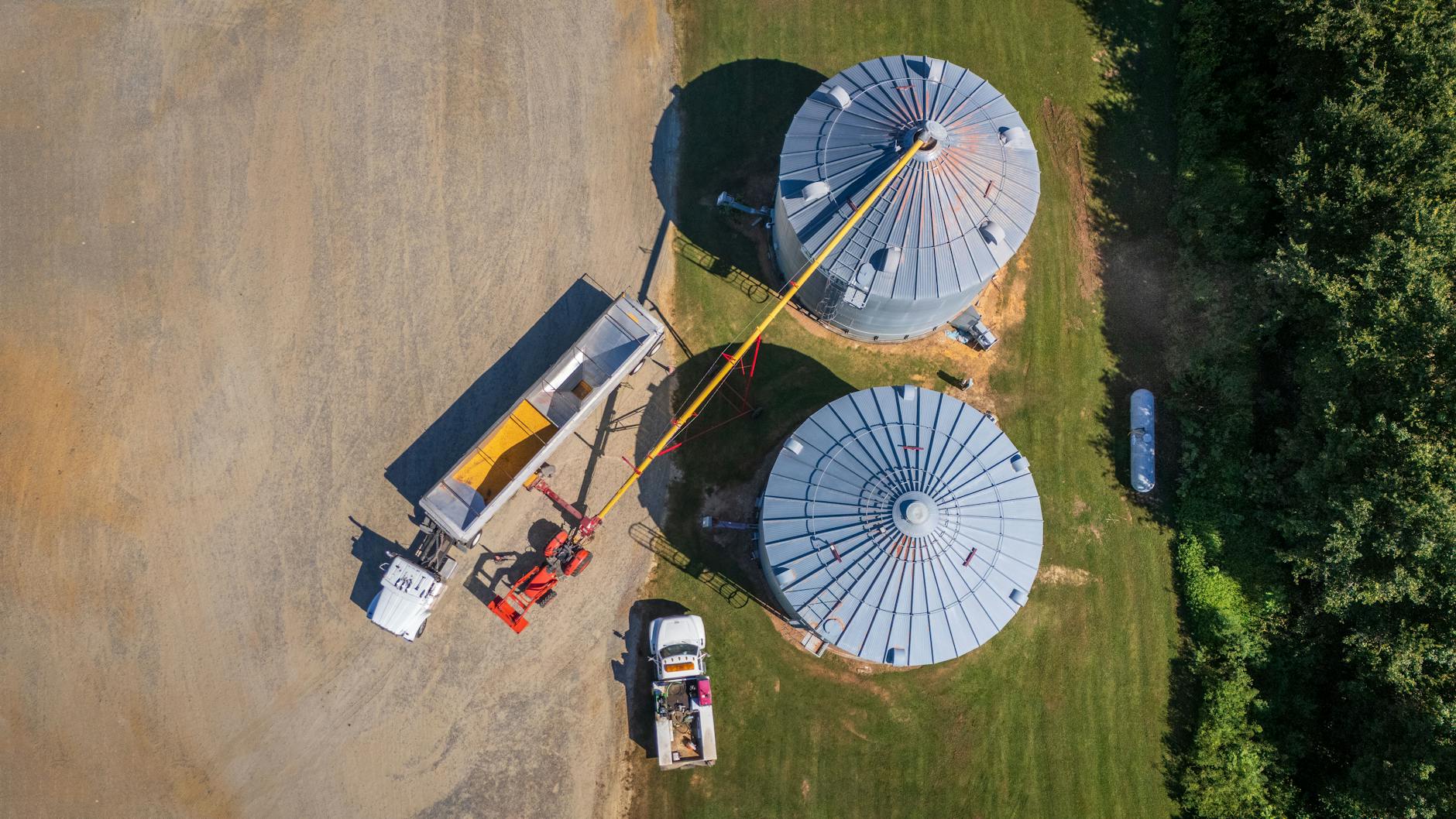 Large grain storage silos and agricultural infrastructure in rural farming community