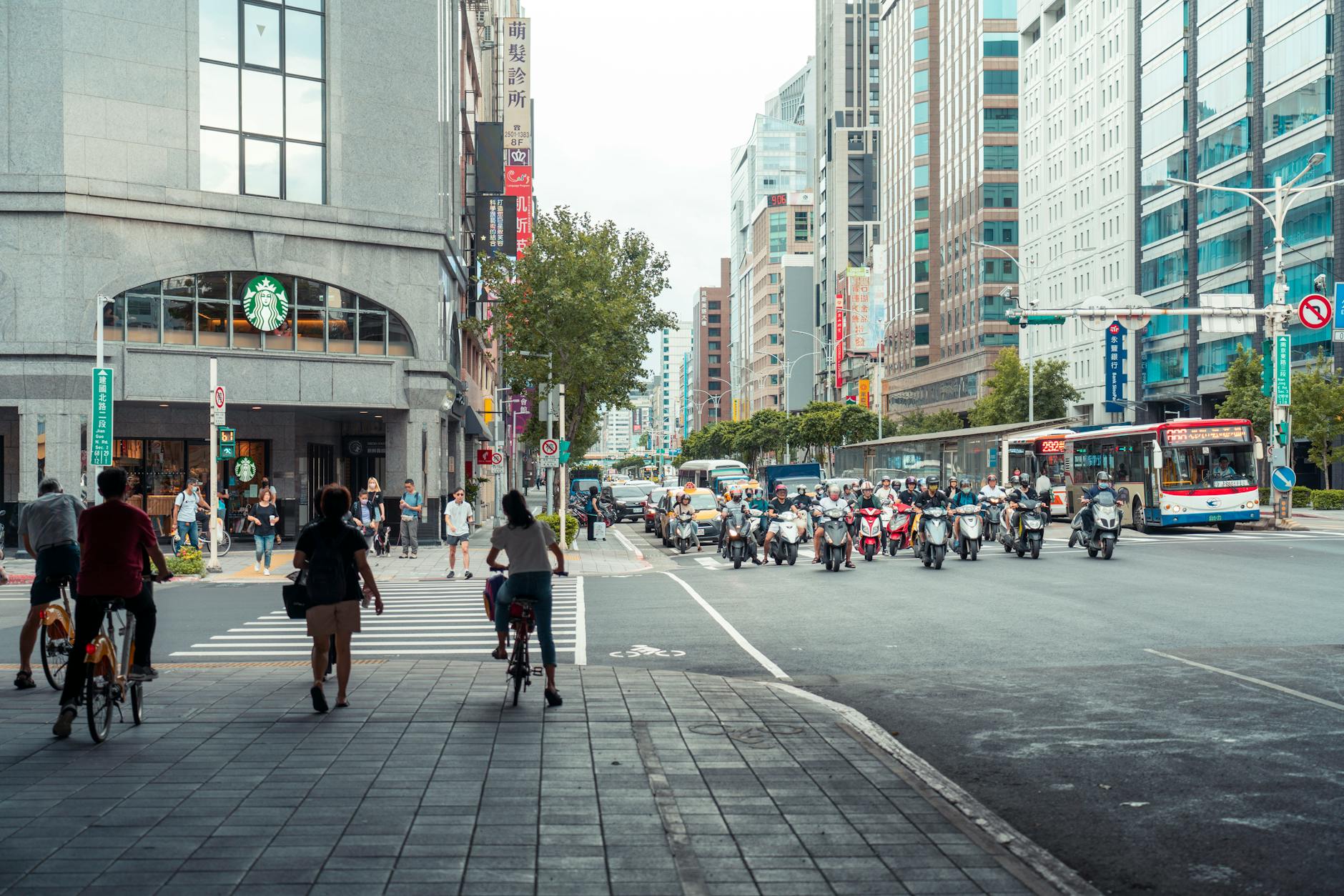 Urban downtown street scene with restaurants and office buildings