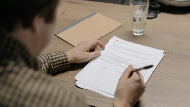 Legal documents and pen on a desk representing estate planning and trust formation