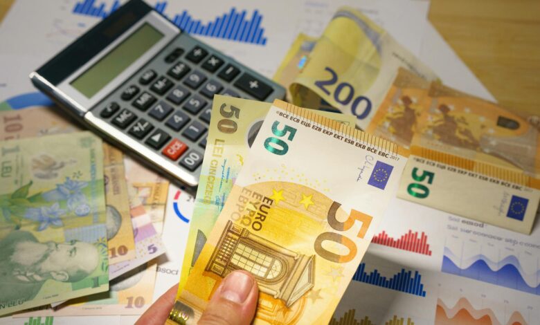 Financial documents and retirement account statements on a desk