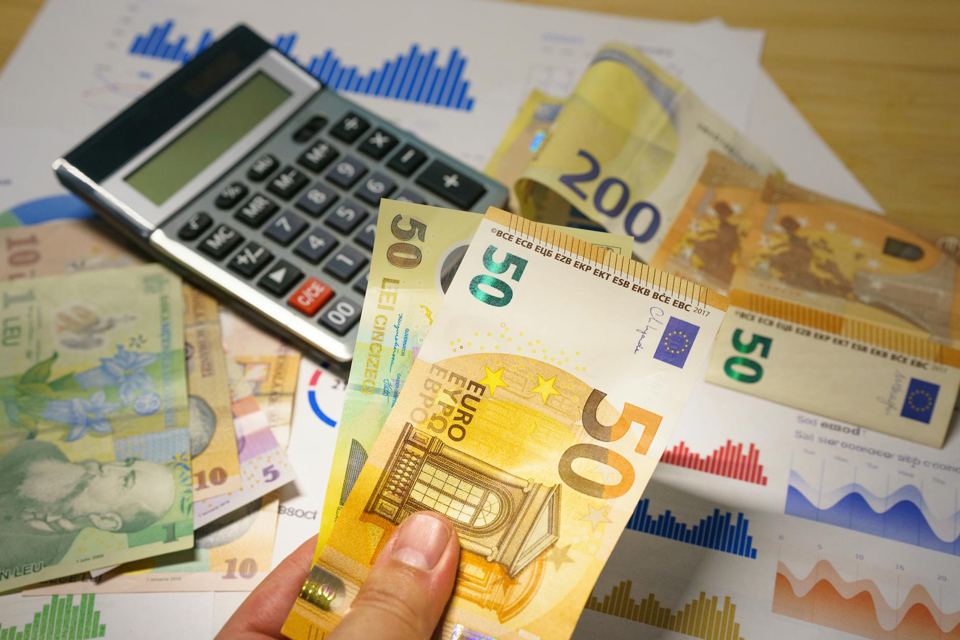 Financial documents and retirement account statements on a desk