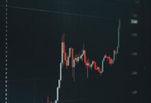 Traders monitoring bond market data on screens in a financial setting