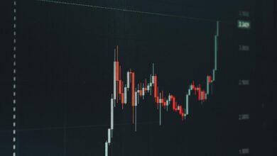 Traders monitoring bond market data on screens in a financial setting
