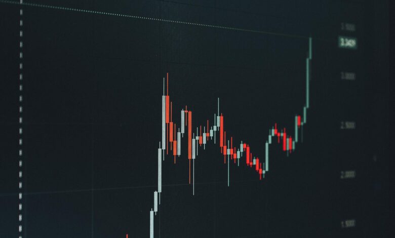 Traders monitoring bond market data on screens in a financial setting