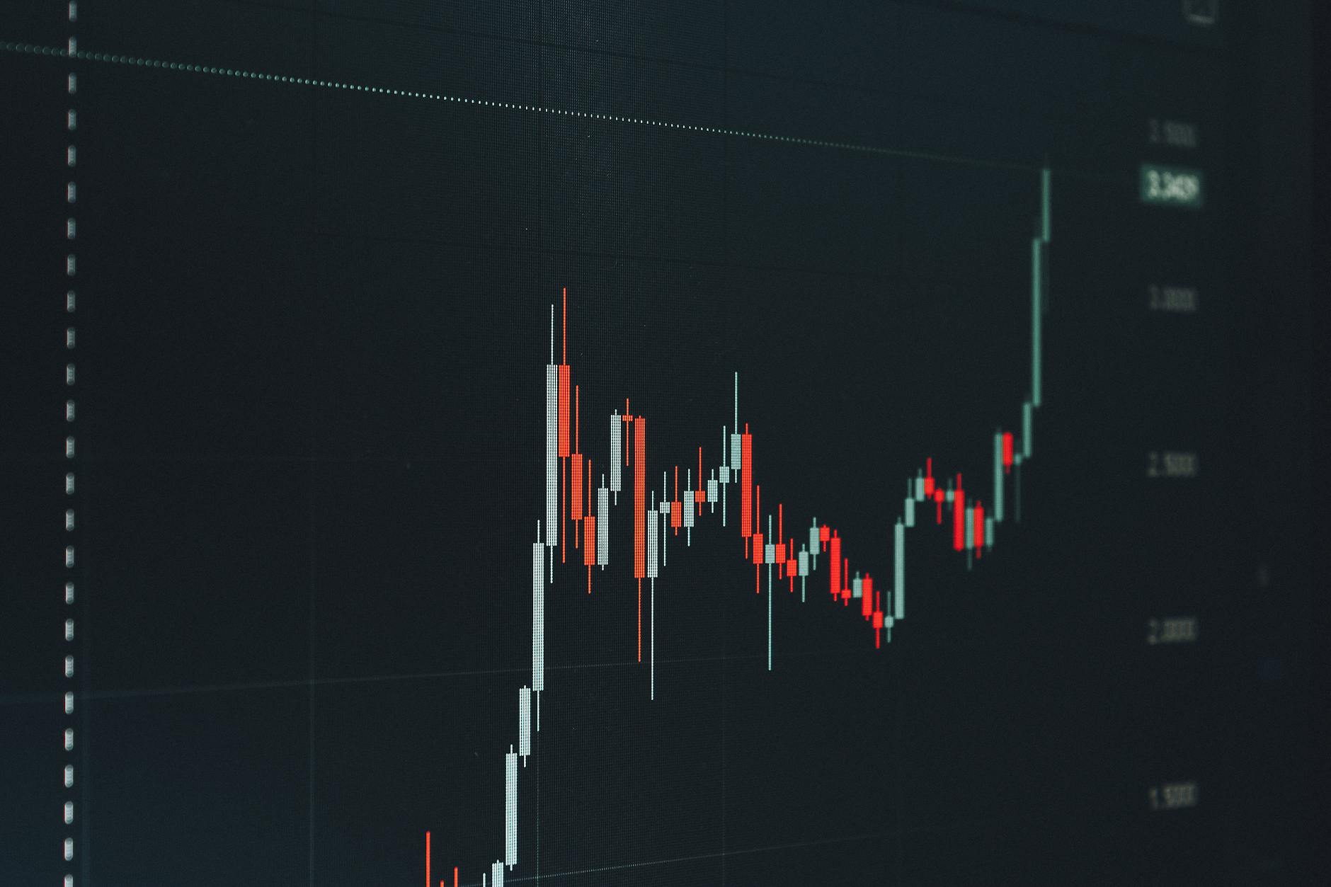Traders monitoring bond market data on screens in a financial setting