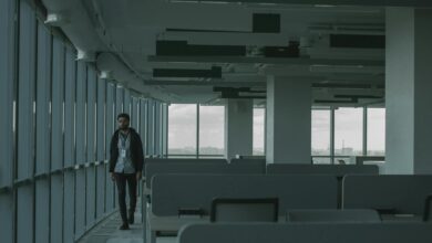 Empty commercial office building interior showing vacant floors and distressed property conditions