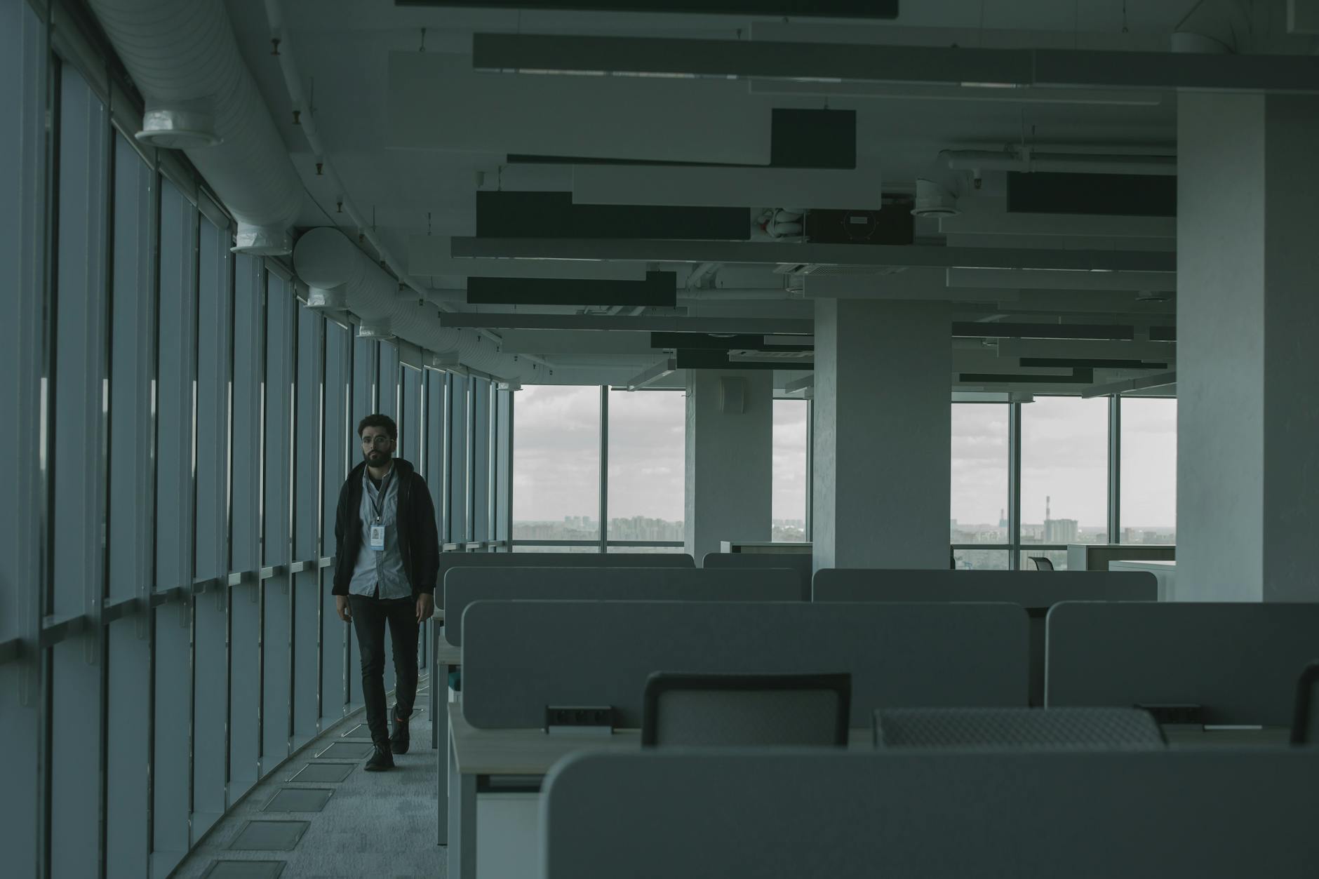Empty commercial office building interior showing vacant floors and distressed property conditions