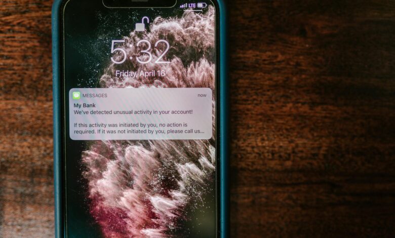 Person using mobile banking app on smartphone screen