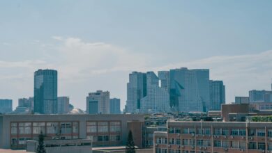 Modern office buildings in downtown financial district representing family office relocations