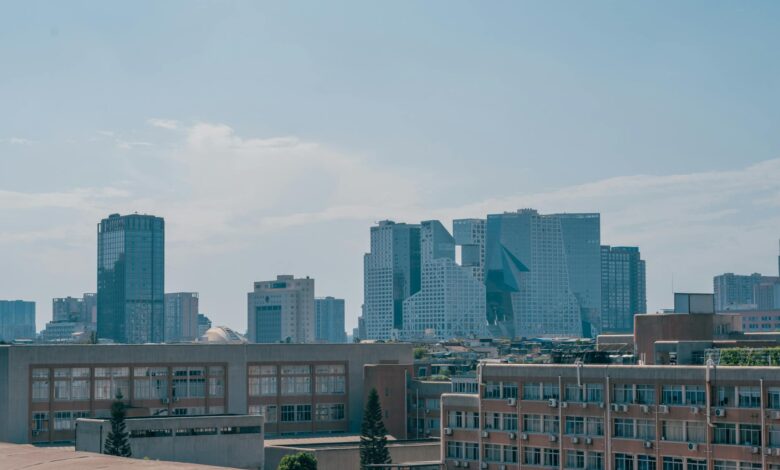 Modern office buildings in downtown financial district representing family office relocations