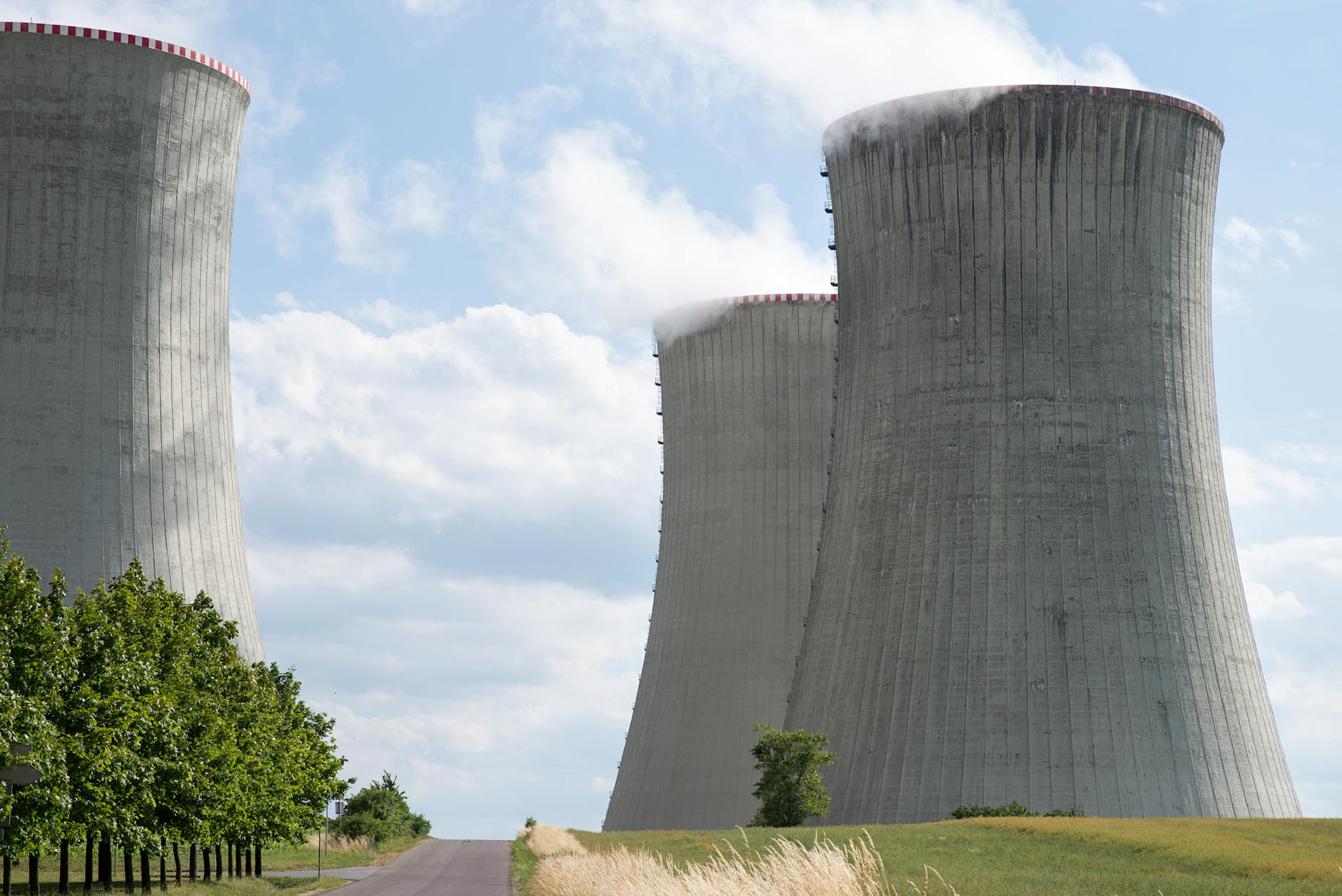 Nuclear power plant cooling towers against blue sky