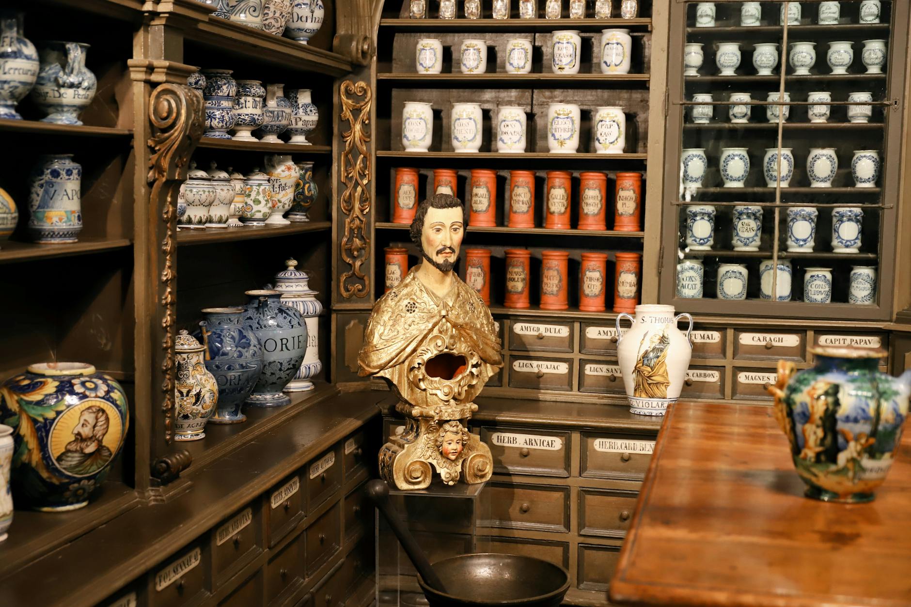 Interior view of modern pharmacy with medication shelves and consultation counter