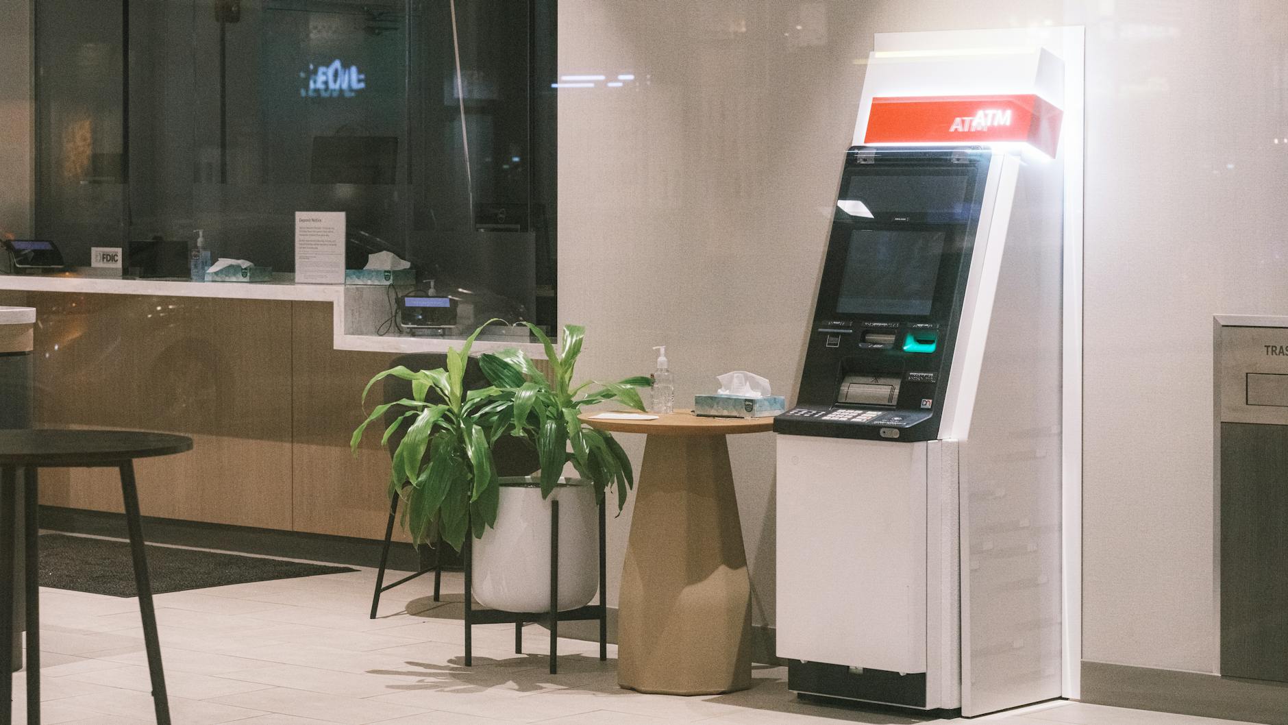 Modern bank interior with teller counters and professional lighting