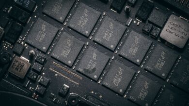 Close-up of a semiconductor microchip on a circuit board representing royalty trust assets
