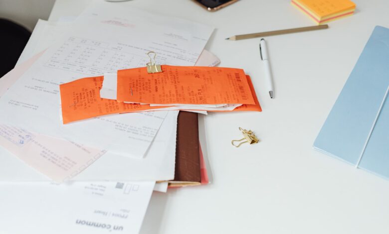 Financial documents and bond paperwork spread across a desk representing structured credit analysis