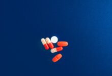 Close-up of pharmaceutical pills representing drug royalty income streams