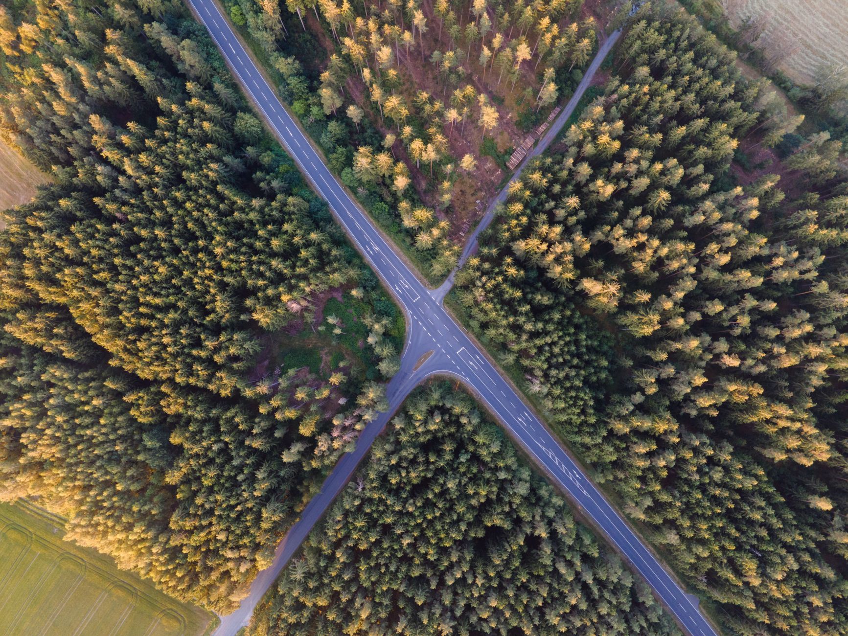 Aerial view of a major toll highway interchange with multiple lanes of traffic