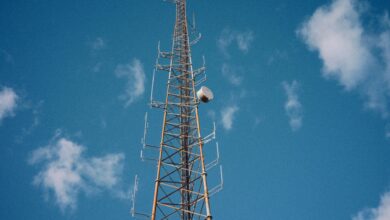 Aerial view of a broadcast communications tower standing in an open landscape