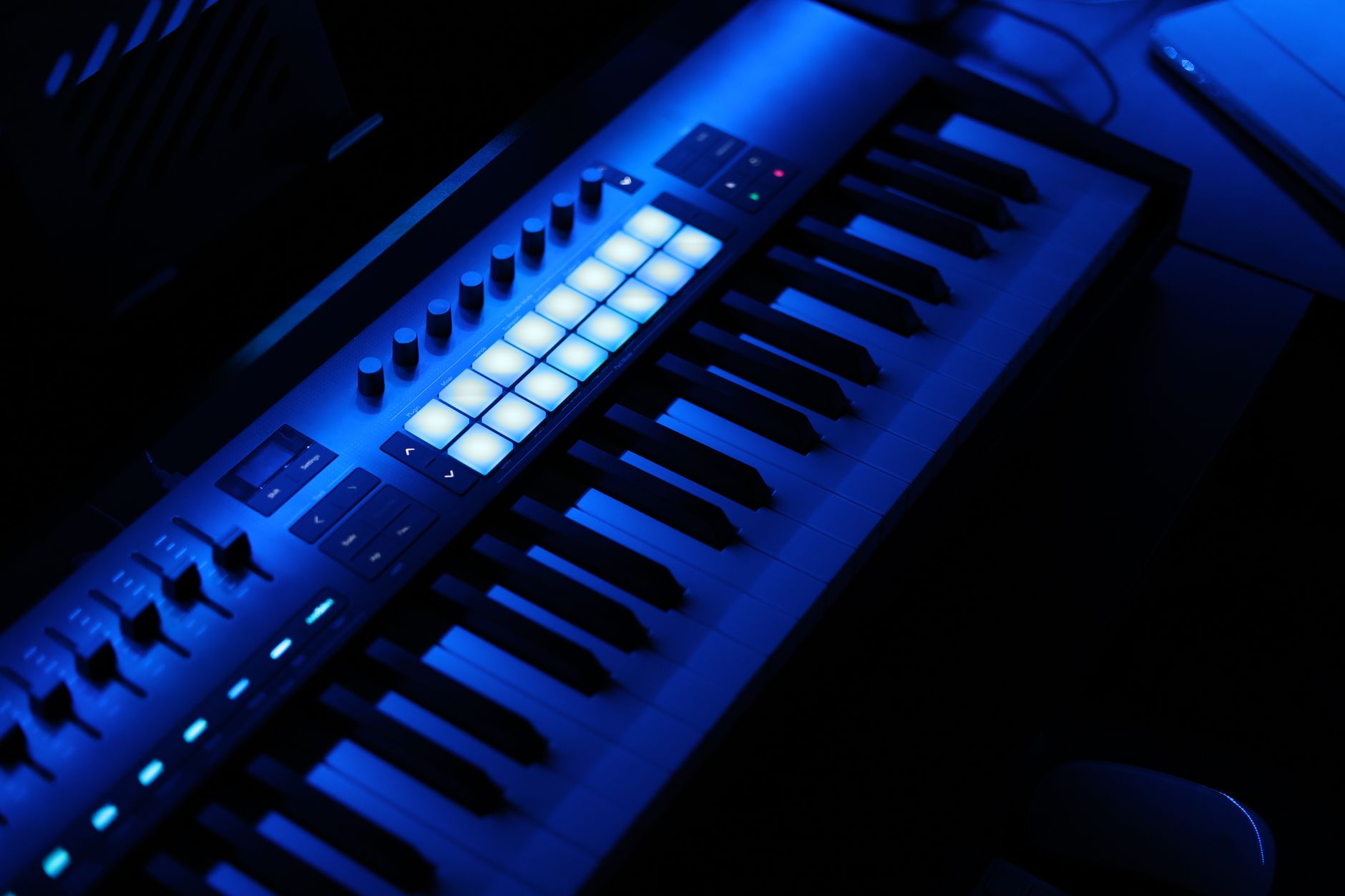 Recording studio with mixing board and microphone representing music intellectual property assets